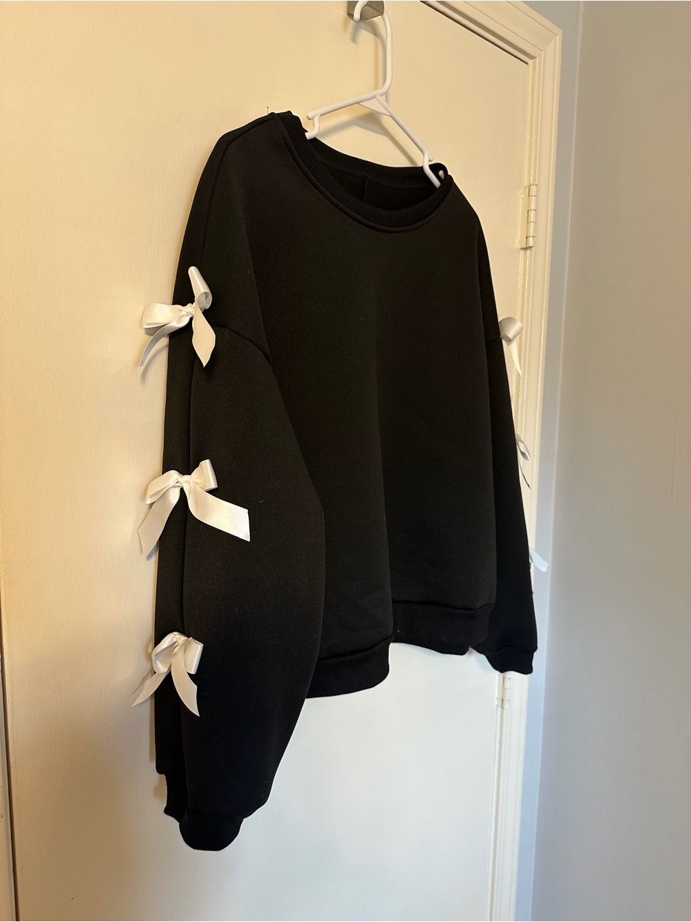 Black Sweatshirt with White Bow Detail